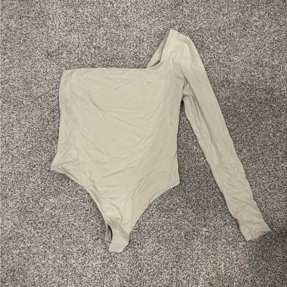 lululemon athletica One-Shoulder Bodysuit in Cream